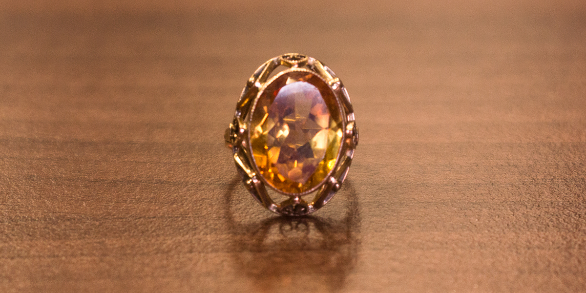 Image of large yellow sapphire dress ring.