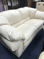 Lot 522 - TWO MODERN CREAM LEATHER SOFAS AND A FOOTSTOOL