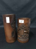 Lot 593 - TWO CARVED BAMBOO BRUSH POTS