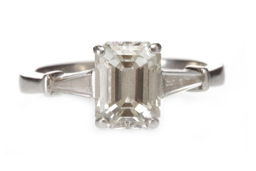 Lot 6 - PLATINUM DIAMOND SOLITAIRE RING set with an...