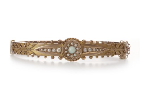 Lot 26 - EDWARDIAN GOLD OPAL AND SEED PEARL BANGLE with...