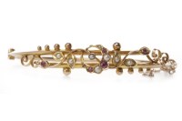 Lot 46 - EDWARDIAN NINE CARAT GOLD RUBY AND SEED PEARL...