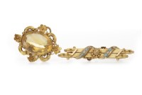 Lot 52 - EARLY VICTORIAN CITRINE BROOCH set with an...
