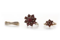 Lot 64 - DRESS RING in the form of a crossover band...