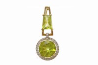 Lot 122 - GREEN GEM AND DIAMOND PENDANT formed by a...