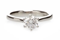 Lot 126 - PLATINUM DIAMOND SOLITAIRE RING with a six...