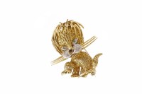 Lot 138 - DIAMOND AND EMERALD SET LION BROOCH in the...