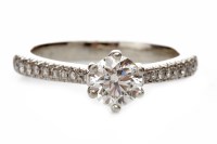Lot 159 - DIAMOND SOLITAIRE RING set with a round...