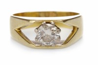 Lot 166 - DIAMOND SINGLE STONE RING 1970s, with a round...