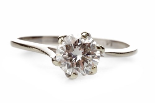Lot 167 - DIAMOND SOLITAIRE RING with a six claw set...