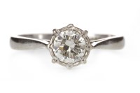 Lot 225 - DIAMOND SOLITAIRE RING with an illusion set...