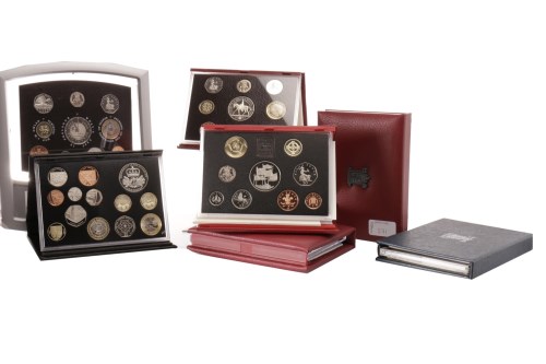 Lot 571 - NINE UK ANNUAL PROOF COINAGE SETS including...