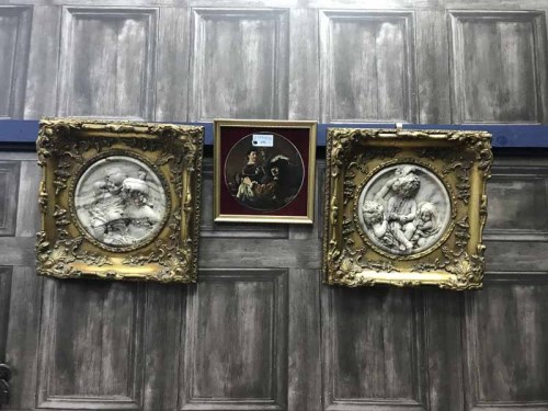 Lot 151 - TWO GILT FRAMED PLAQUES together with a...