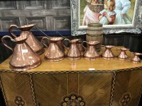 Lot 305 - GRADUATED SET OF COPPER FLAGONS AND MEASURES