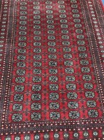 Lot 401 - PERSIAN FRINGED AND MULTI BORDERED RUG