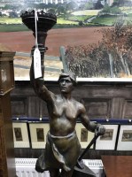 Lot 443 - SPELTER FIGURE OF A MAN HOLDING A TORCH signed...