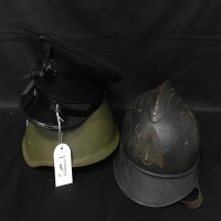 Lot 445 - TWO MILITARY STYLE HELMETS together with...