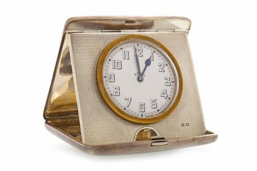 Lot 844 - GEORGE V SILVER CASED DESK CLOCK maker Synyer...