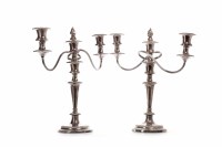 Lot 854 - PAIR OF SILVER PLATED TWO BRANCH CANDELABRA by...