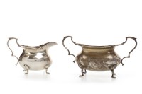Lot 870 - EARLY 20TH CENTURY DOUBLE HANDLED SILVER SUGAR...