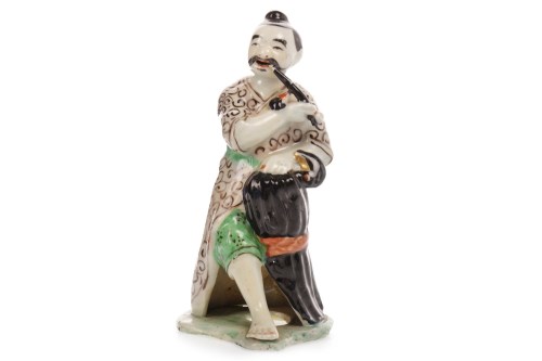 Lot 1056 - LATE QING CHINESE POLYCHROME FIGURE OF A...