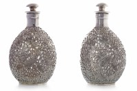 Lot 1069 - PAIR OF ASIAN SILVER OVERLAID 'DIMPLE'...