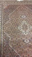 Lot 1124 - PERSIAN FRINGED AND MULTI BORDERED RUG with...