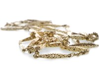 Lot 509 - ORNATE CHAIN NECKLACE formed by pierced links...