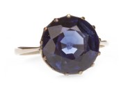 Lot 515 - IMPRESSIVE CREATED SAPPHIRE RING set with a...