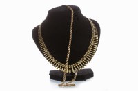 Lot 520 - CHAIN NECKLET formed by ornate tapered drops...
