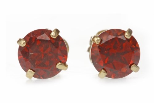 Lot 529 - PAIR OF GARNET EARRINGS each set with a round...