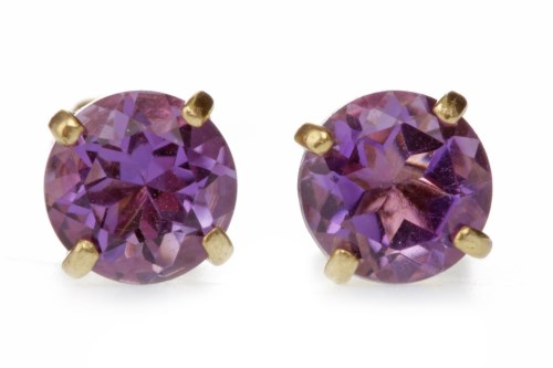 Lot 531 - PAIR OF AMETHYST EARRINGS each set with a...