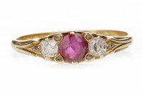 Lot 571 - RED GEM AND DIAMOND RING set with a central...