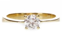 Lot 591 - GEM SET SOLITAIRE RING set with a round white...