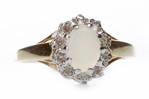 Lot 704 - OPAL AND DIAMOND CLUSTER RING set with a...