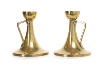 Lot 1603 - PAIR OF ARTS & CRAFTS BRASS CANDLESTICKS with...