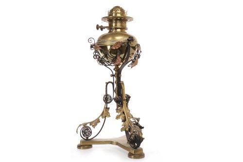 Lot 1644 - VICTORIAN BRASS OIL LAMP the reservoir raised...