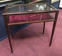 Lot 1647 - MAHOGANY OBLONG CURIO TABLE with hinged top on...