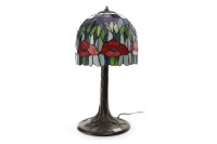 Lot 1662 - TIFFANY STYLE TABLE LAMP the domed leaded...