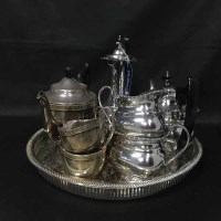 Lot 95 - TWO SILVER PLATED TEA SERVICES along with an...