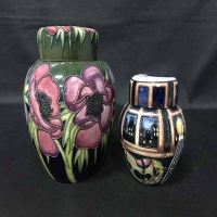 Lot 239 - TWO CONTEMPORARY MOORCROFT GINGER JARS WITH...