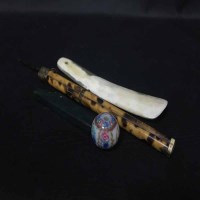 Lot 276 - JAPANESE NEEDLE HOLDER along with other...