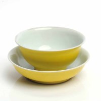 Lot 313 - TWO 20TH CENTURY CHINESE YELLOW GLAZE DISHES...
