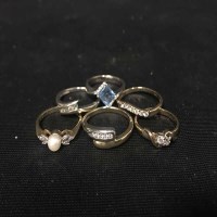 Lot 389 - PEARL AND DIAMOND RING along with five other...