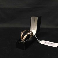 Lot 418 - TWO MODERN GOLD BANGLES both with import marks...