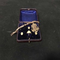Lot 459 - NINE CARAT GOLD SHIELD FOB along with two 9ct...