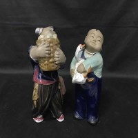 Lot 475 - TWO CHINESE CERAMIC FIGURES OF CHILDREN one...
