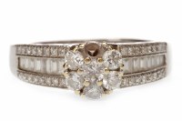 Lot 574 - DIAMOND CLUSTER RING formed by a diamond...