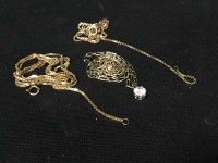 Lot 12 - GOLD NECKCHAIN WITH WHITE STONE DROP along...