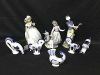 Lot 132 - THREE LLADRO FIGURES along with five USSR blue...